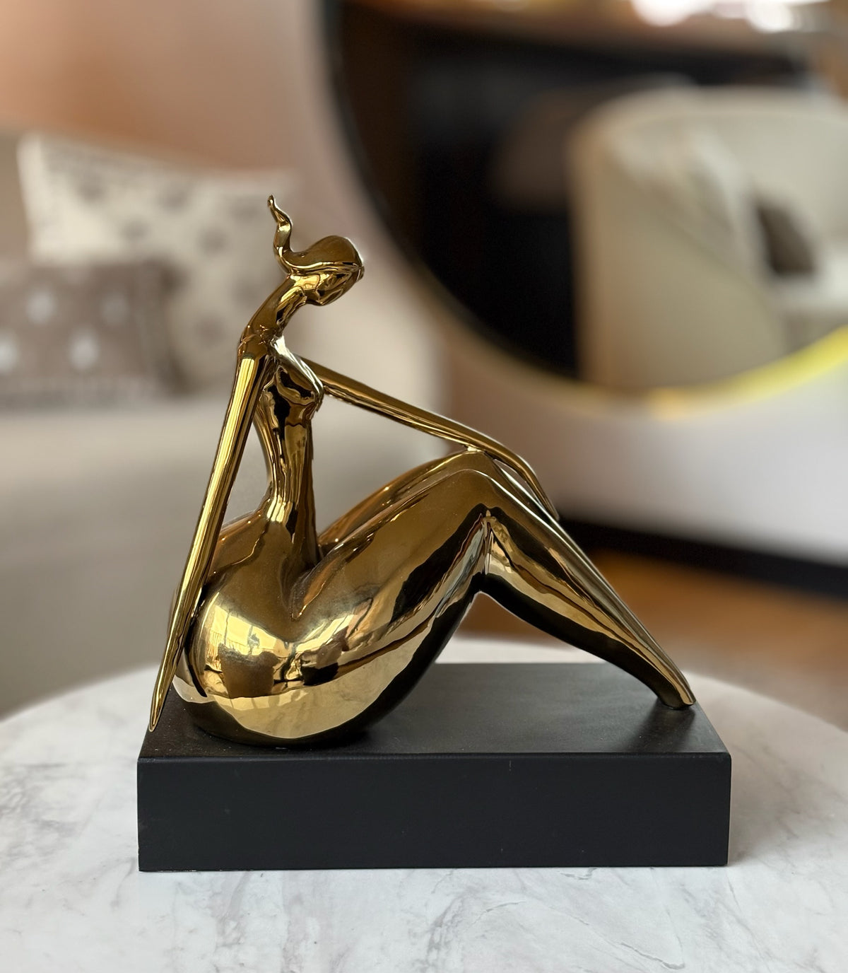 Golden Woman Sculpture